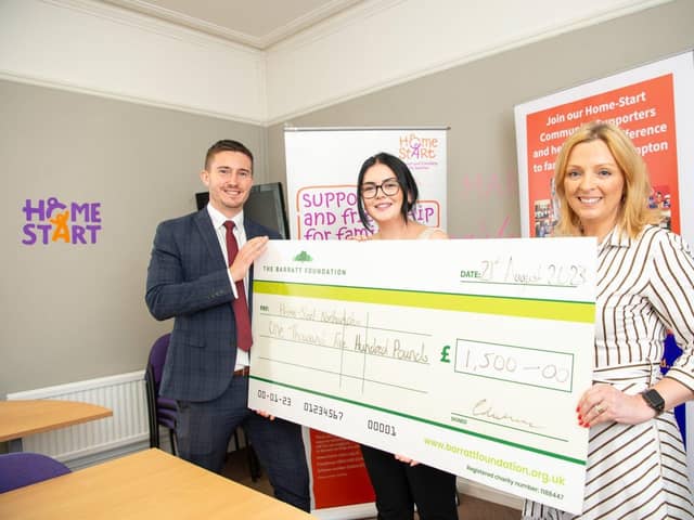 BN - SGB-8621 Matt and Mollie from Barratt Homes presenting a cheque to Zoe Reynolds
