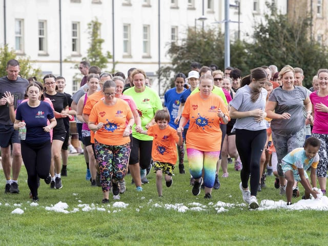 A family-friendly fun run, with water slides and obstacles, took place at Upton Country Park on Saturday (August 12) to raise funds for a Northampton charity.