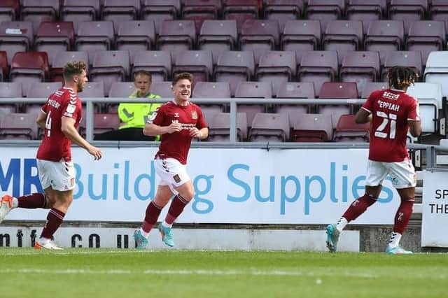 Sam Hoskins celebrates firing the Cobblers into a 1-0 lead against Harrogate Town (Picture: Pete Norton/Getty Images)