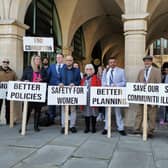 Labour councillors Danielle Stone (middle) and Enam Haque (right middle) led the protest outside the Guildhall on Thursday night just before a full council meeting