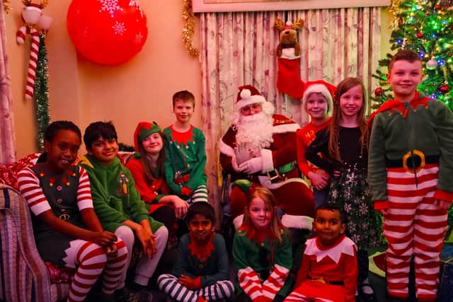 The elves were delighted to meet Father Christmas in the homes sensory Santa's Grotto.