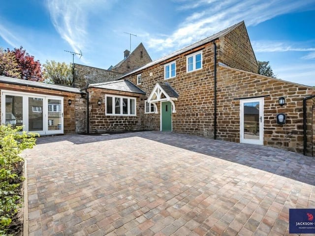 The period stone property makes a powerful first impression on visitors