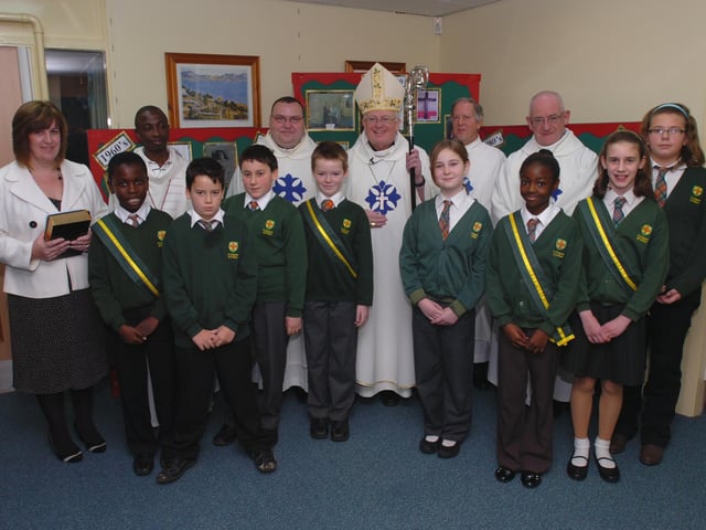 St Margaret of Scotland Primary School. Blessing of the newly expanded school by the Bishop of Northampton, Peter Doyle. The Bishop (centre) with pupils and head teacher Catherine Cassidy (left). Pictured in 2010.