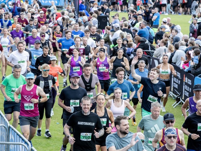 Hundreds of runners braved showers and wind to take on the race on Sunday (May 25), which started and finished at Sixfields stadium.