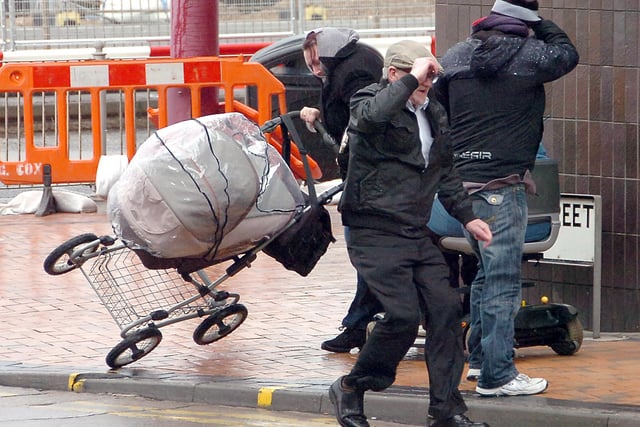 Gale force winds lift a pram off the ground at the corner of Adelaide Street West and the promenade, Blackpool, November 2011