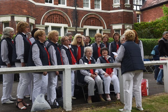 A choir entertaining shoppers at the Westoe Village Fair six years ago. Is there someone you know in the photo?