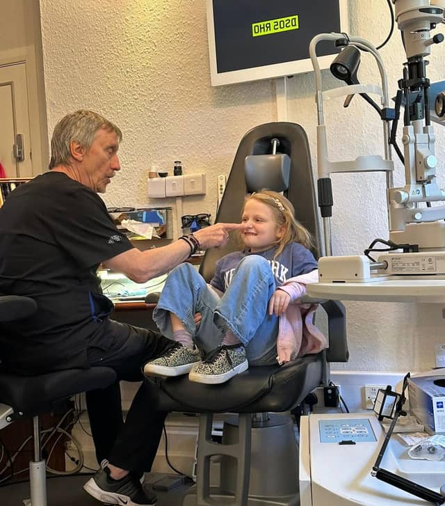Brian Tompkins with a young patient
