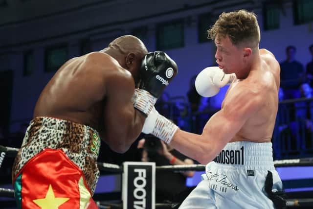 Carl Fail lands a body blow on Serge Ambomo at York Hall on Friday night