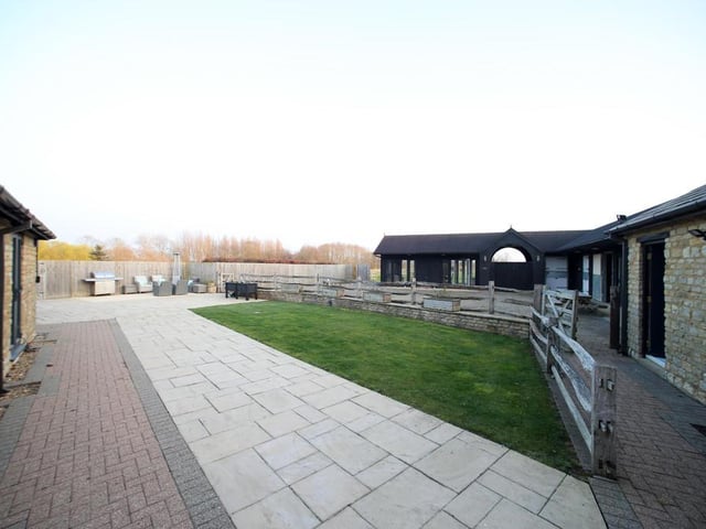 This barn conversion with traditional features and a lot of land could be yours for £1.75 million.