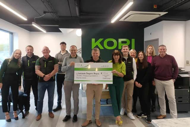 Kori Construction presents a cheque to Lakelands Hospice after successful fund-raising year