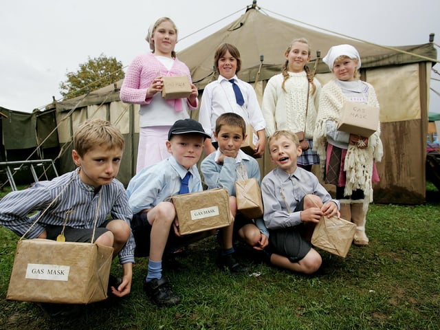 1940s weekend at Northampton and Lamport railway. Children from Chapel Brampton primary school dressed as evacuees.