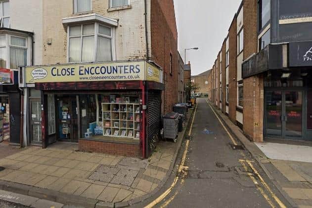 The Close Encounters team say the side street next to their shop, Chapel Place, is a 'public health hazard'