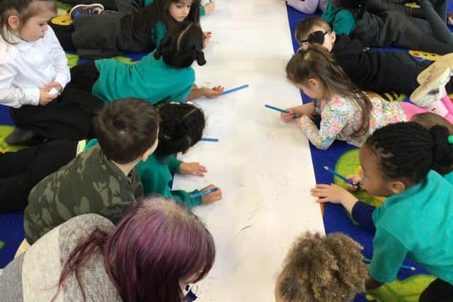 Children enjoying activities at Queen Eleanor Primary Academy