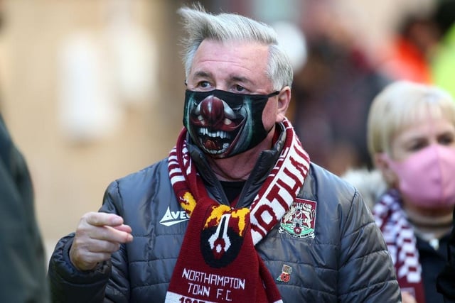 Northampton Town fans return to watch their team for the first game since 07.03.20 due to the coronavirus pandemic during the Sky Bet League One match between Northampton Town and Doncaster Rovers at PTS Academy Stadium on December 05, 2020.