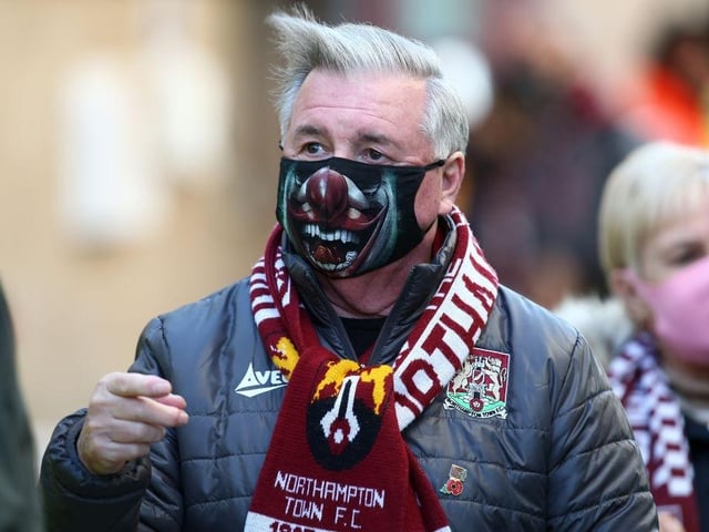 Northampton Town fans return to watch their team for the first game since 07.03.20 due to the coronavirus pandemic during the Sky Bet League One match between Northampton Town and Doncaster Rovers at PTS Academy Stadium on December 05, 2020.