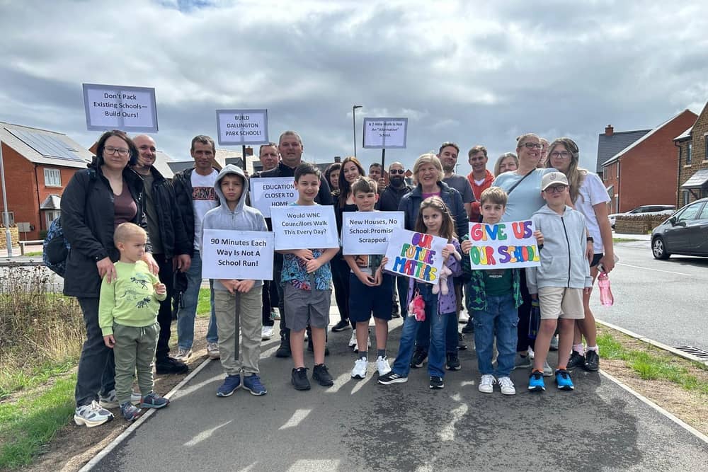 Parents and children from Dallington Grange have marched 3.5 miles to show the journey pupils could face to school after plans for a new secondary school were scrapped.