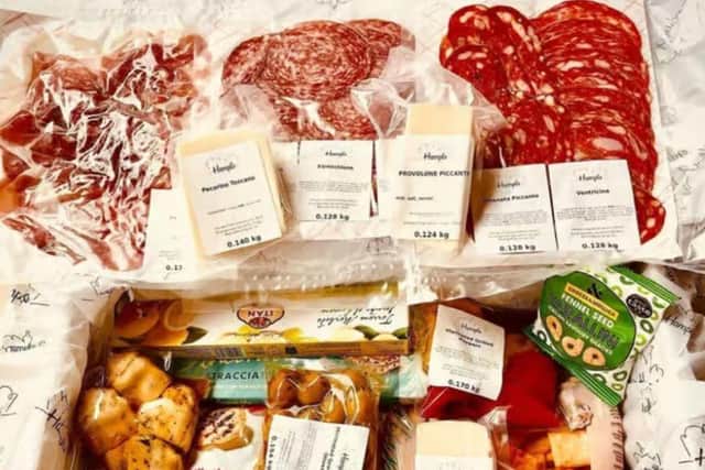 The hampers contain real Italian food and brands, and Adriana slices, vacuum packs and labels all the cured meats, fresh cheeses, antipasti and olives. These are chosen based on the style, tastes and price the customer has selected.