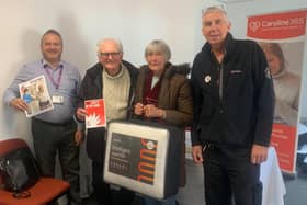 Photo of and Roger Harris from Age UK Northamptonshire with Colin and Susanne Stephens and Norman James, Community Safety Officer for Northamptonshire Fire & Rescue Service.