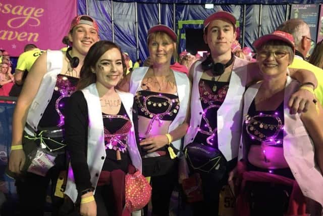 Lorraine (centre) at The MoonWalk London 2019, with family members including sons Harrison and Adam