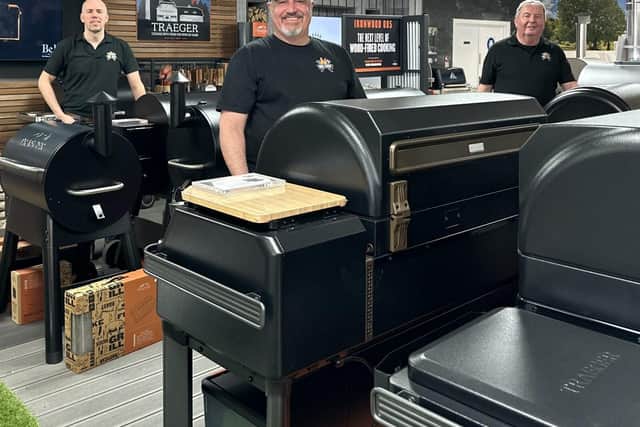 The Bell of Northampton barbecue team celebrate the launch of the new-look shop.