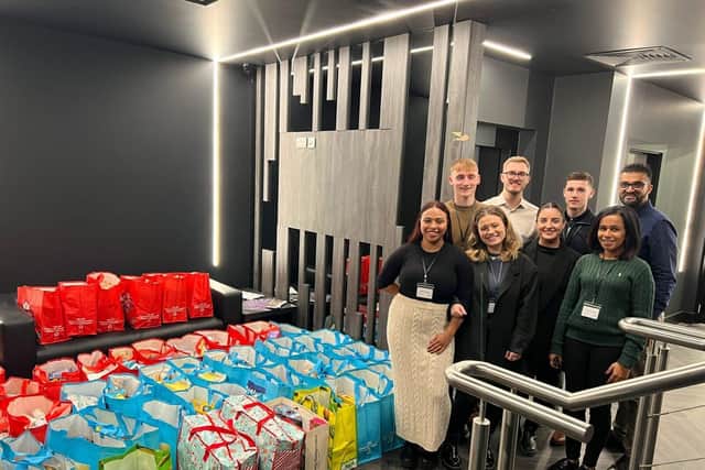 Some of the Bhangals Construction Consultants team with the hampers
