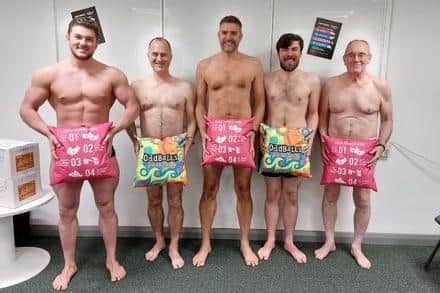 Waitrose employees posed in their underwear to raise money for the cause.