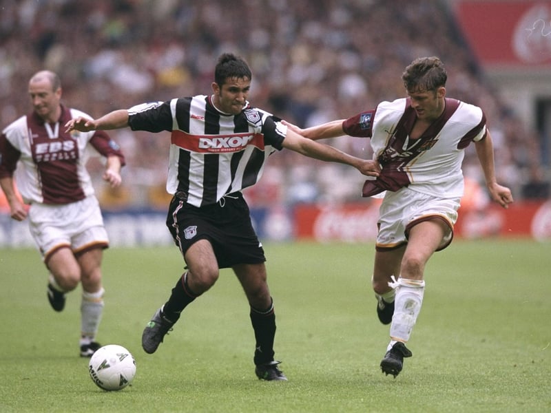 Ray Warburton of Northampton Town is held off by Jack Lester of Grimsby Town during the Nationwide League Division Two play-off final at Wembley Stadium in London. Grimsby Town won the match 1-0. \ Mandatory Credit: Shaun  Botterill/Allsport