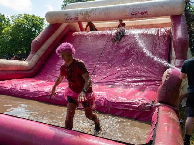 Runners taking part in the Pretty Muddy Race For Life at Abington Park in Northampton on Saturday, July, 11, 20026. Photo by David Jackson.