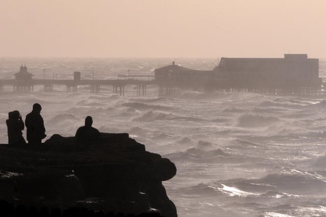 A silhouette scene which captures the power of the waves off the Fylde Coast