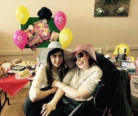 Dionne and Amelia Ferguson celebrating Wear A Hat Day in 2017