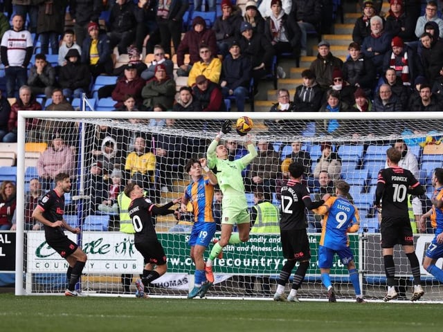 Decent stop from Marquis. Maybe could have parried the ball away from danger but he needed more help from his defence. Wasn't always convincing when dealing with Shrewsbury's many corners but he did enough, punching or catching effectively under pressure... 6.5