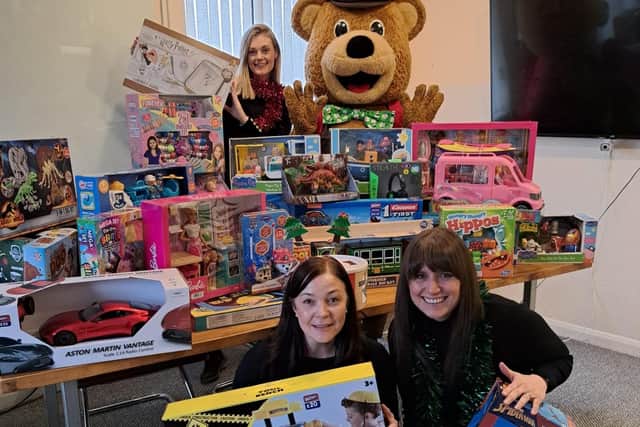 Wicky Bear and staff at Wicksteed Park