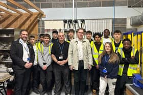 Dan Crask is pictured centre with staff and students from Northampton College