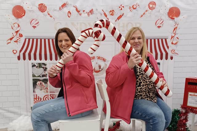 KidsAid's fundraising coordinator Lorraine (left) and office administrator Charlotte (right) at the Christmas photoshoot for the Big Give campaign.