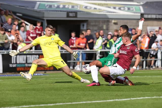 Sam Hoskins is denied by some last-ditch defending from Wycombe. Picture: Pete Norton