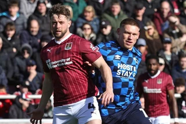 Cobblers' Jack Sowerby in action alongside Derby County striker Martyn Waghorn at Sixfields (Picture: Pete Norton)