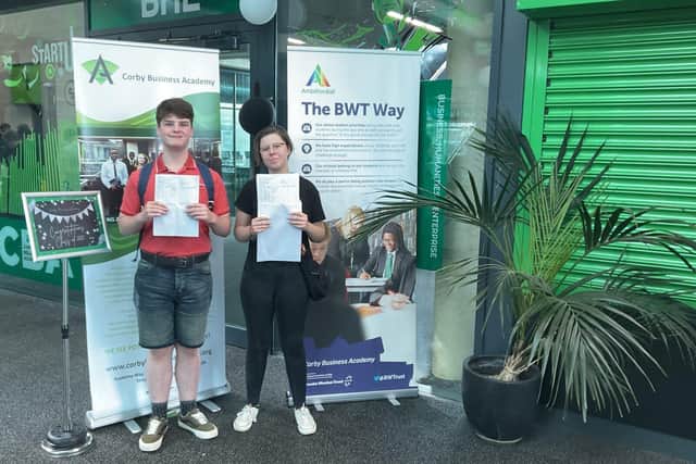 Hanna & TK celebrate their results at Corby Business Academy
