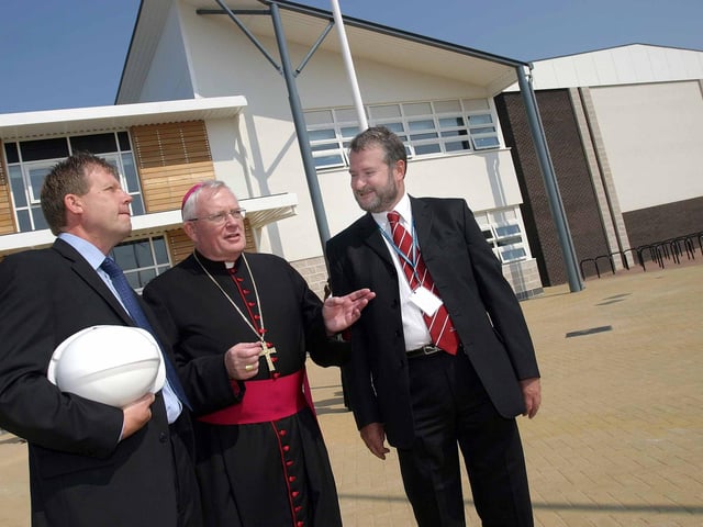 The Roman Catholic Bishop of Northampton the Rt Rev Peter Doyle dropped into Thomas Becket School to officially open a new sports hall which forms part of a £7.1 million building project. Bishop Peter joined Jerry Finch, the site manager of construction company Bluestone and headteacher Thomas Percy at the school in Kettering Road at an opening event for the new sporting facility. July 2006