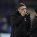 Cobblers boss Jon Brady shows his disappointment during the Cobblers' 5-1 hammering at the hands of Peterborough United on Tuesday (Photo by Pete Norton/Getty Images)