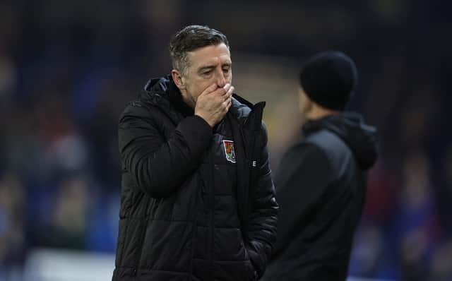 Cobblers boss Jon Brady shows his disappointment during the Cobblers' 5-1 hammering at the hands of Peterborough United on Tuesday (Photo by Pete Norton/Getty Images)
