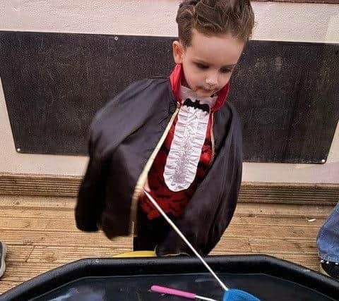 'Dracula' playing hook-a-duck