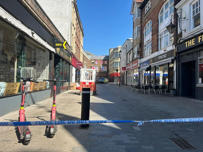 Part of Fish Street, leading to Abington Street, is closed by police.