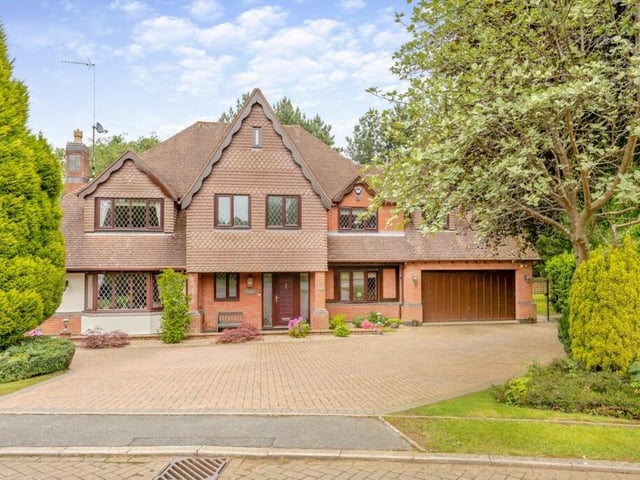 The property makes a bold first impression with a sweeping driveway and a well thought-out extension