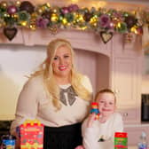 Louise Pentland and daughter Pearl with the new Paddington Happy Meal toys and books