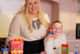 Louise Pentland and daughter Pearl with the new Paddington Happy Meal toys and books