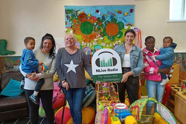 Tracey Hamilton - Charity Manager The Spring Charity, and Beth Jones from NLive Radio in the centre with two members of the community who use the charity