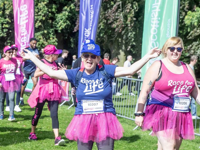 Walkers, runners and joggers completed two laps of Abington Park for the 10k Race for Life on Sunday (July 14).