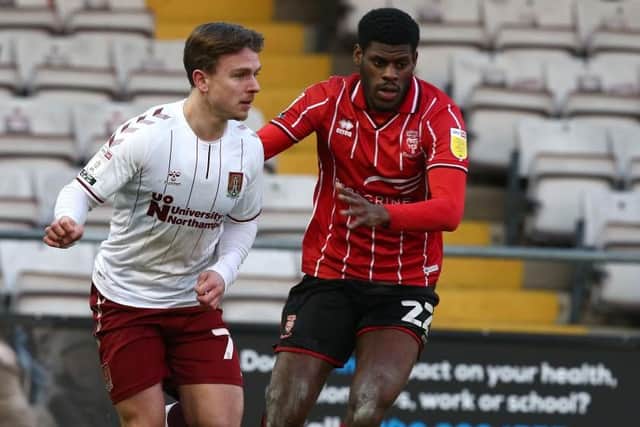 TJ Eyoma in action for Lincoln City against the Cobblers (Photo by Pete Norton/Getty Images)