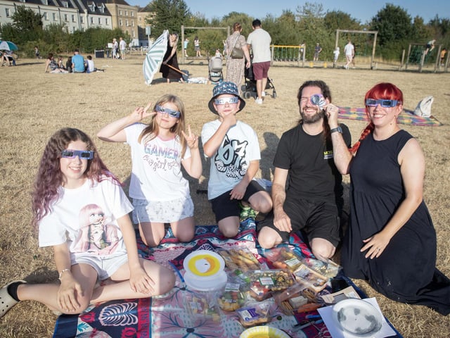 Families gathered at Upton Park on Wednesday night to watch the eclipse