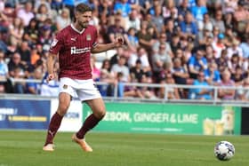 Captain Jon Guthrie on the ball during the Sky Bet League One match between Northampton Town and Peterborough United at Sixfields on August 19, 2023 in Northampton, England. (Photo by Pete Norton/Getty Images)